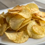 Are potato chips gluten free? Homemade gluten-free potato chips on a plate