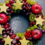 Beautifully crafted Christmas Fruit Wreath with seasonal decorations