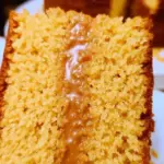 Delicious homemade cornbread cake served on a wooden table