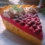 Slice of cranberry custard pie topped with whipped cream on a rustic table