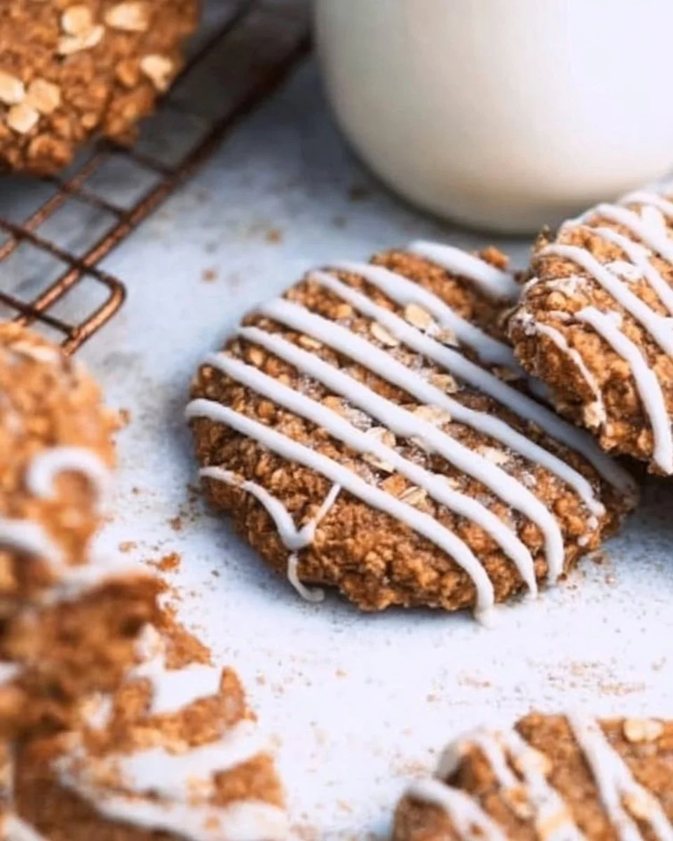 Healthy iced gingerbread oatmeal cookies on a festive plate