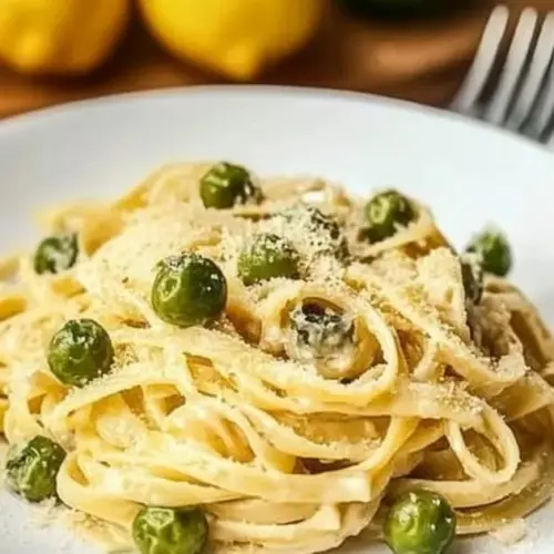 Delicious Dirty Martini Pasta garnished with olives and herbs